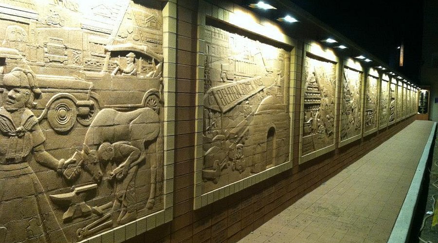 Explore Unique Brick Wall Sculpture Art in Sugarcreek Ohio