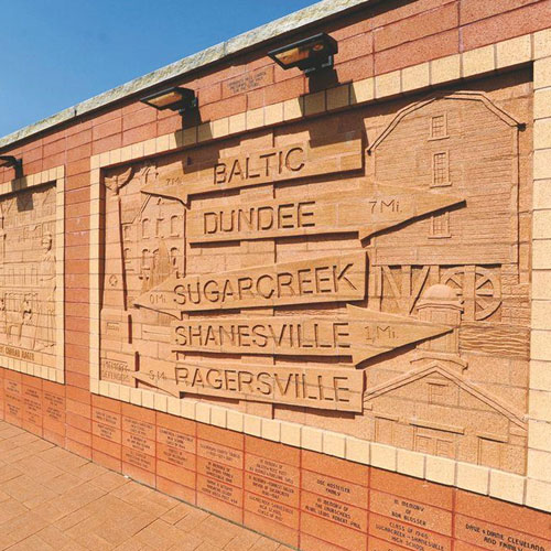 Explore Unique Brick Wall Sculpture Art in Sugarcreek Ohio