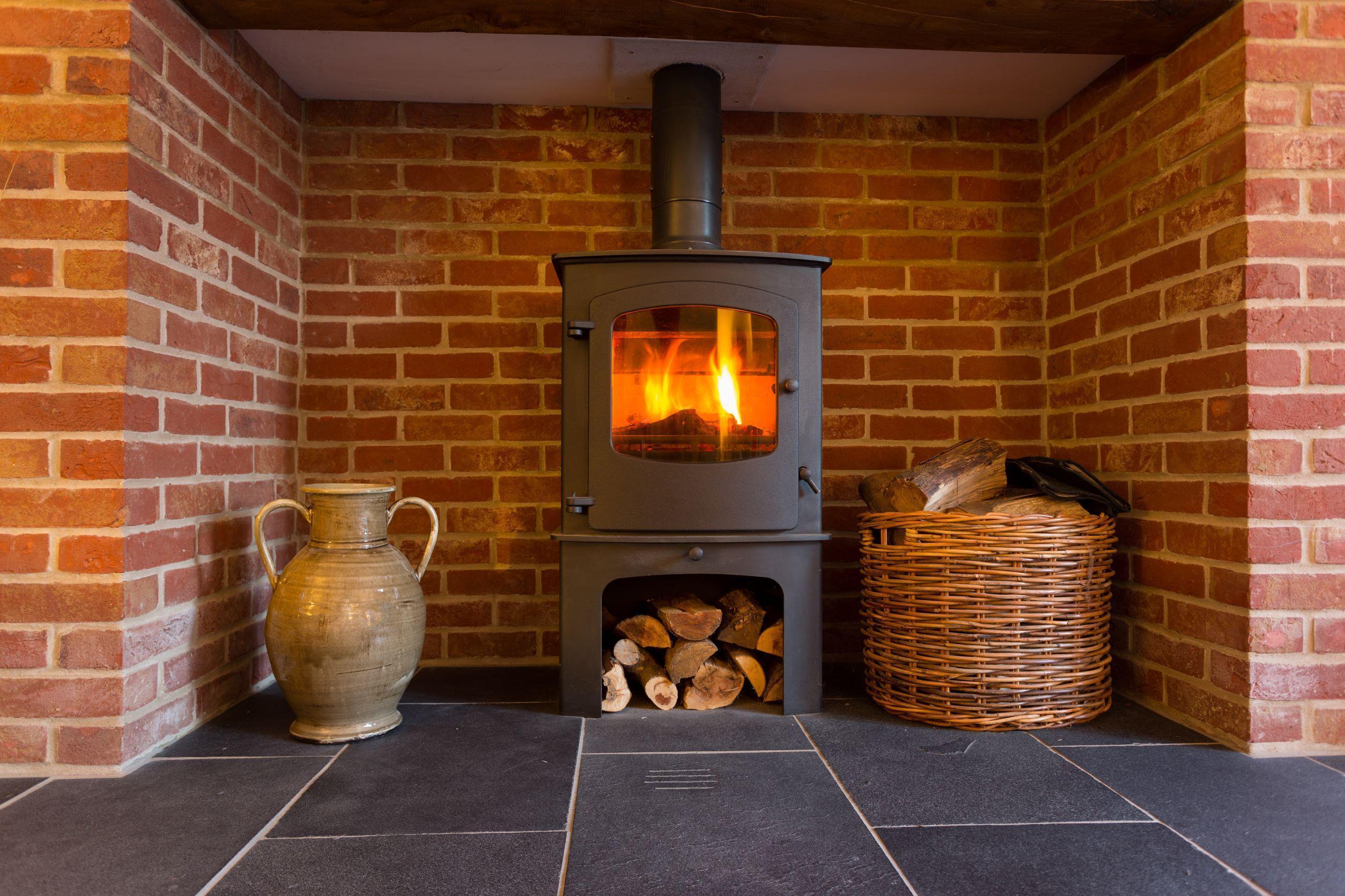 Need a Brick Wall for Wood Stove? Cost, Benefits, & Pro Installation.